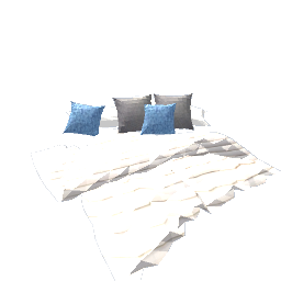white blanket with blue and gray pillows