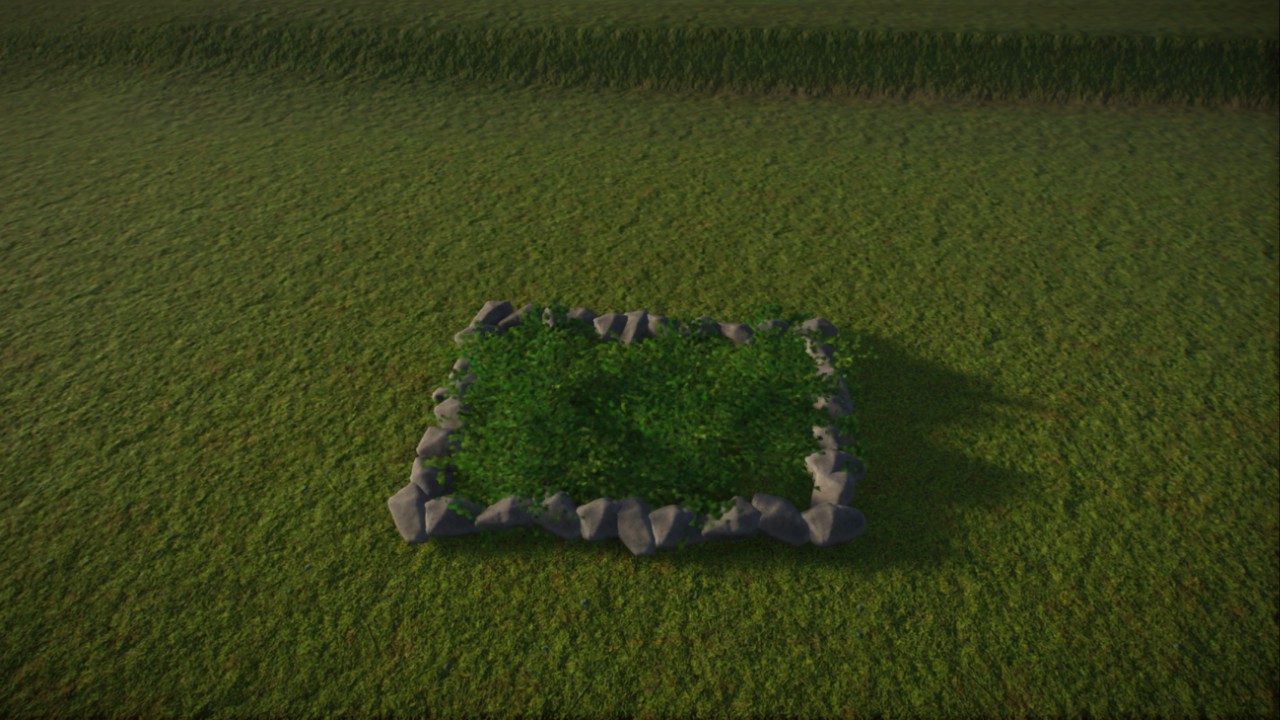 Little garden with bushes and rocks around them