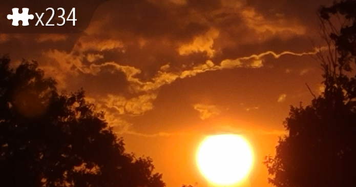 Orange Sun Near the Horizon