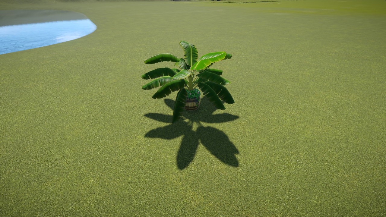 Simple small palm tree with flower pot
